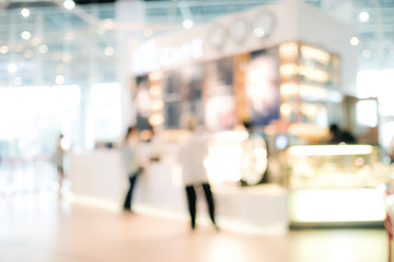 Blurred people background : blur people at cafe with bokeh light background, banner, food and drink concept