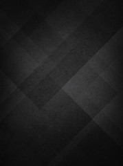 Obraz premium abstract black background with texture and geometric pattern design of triangle shapes