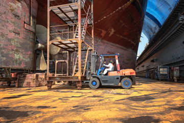 Fototapeta na wymiar preparation and arrangement of the labor on floating dry dock for repairing, recondition and painting with sandblasting overhaul the ship
