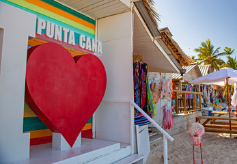 Colorful souvenirs in Punta Cana beach, Dominican Republic - obrazy, fototapety, plakaty