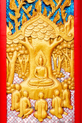 Stucco images, Buddhist church walls in Thailand