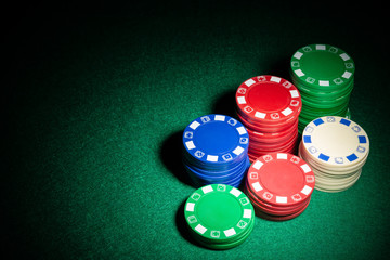 gambling chips highlighted on casino table