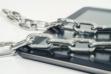 Obraz premium Chain on tablet concept new Business technology Blockchain.