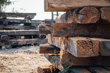 Pile of old wooden railway sleepers.
