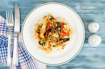 Healthy food without meat, rice with vegetables.