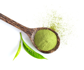 tea leaf and matcha green tea powder in wood spoon isolated on white background. top view