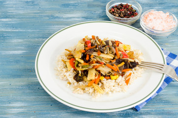 Healthy food without meat, rice with vegetables.