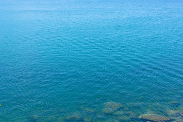 Fototapeta na wymiar wide sea near coastlines, it's so blue and clear. Look peaceful with nothing else