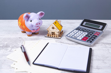 business,  house and piggy bank