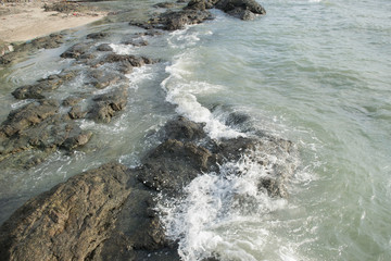 waves crashing on the rocks