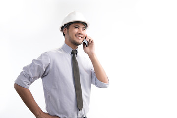 Portrait of asian engineer or architect smiling and using a cellphone isolated on white background