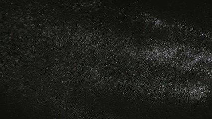 Snow falling background. Background of snow fall blowing fast in night winter blizzard.