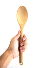 Male hand holding a jar of spice on white background