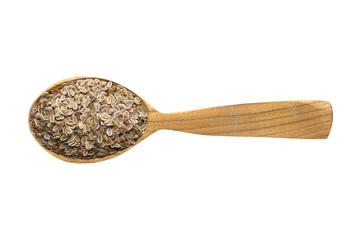 dill seed in wooden spoon isolated on white background. spice for cooking food, top view.