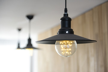 Incandescent lamps in a modern cafe.