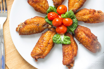 Fried chicken on white plate, top view - Image