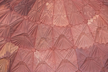 The details of intricate carvings of roof inside the Qutub Minar complex, Delhi, India