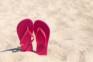 Fototapeta na wymiar flip flops at beach