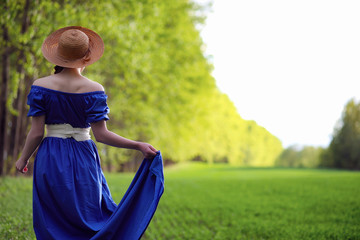 Girl in the countryside in the evening