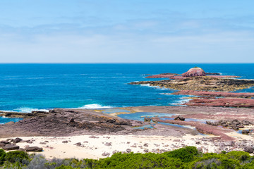 Fototapeta na wymiar View over the rocky coastline at Heycock Point, known for whale watching, scenic coastal views and and birdwatching, in Ben Boyd National Park, Australia