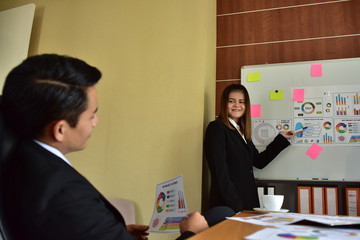 A group of young business people are meeting and having fun talking. And sometimes stressful