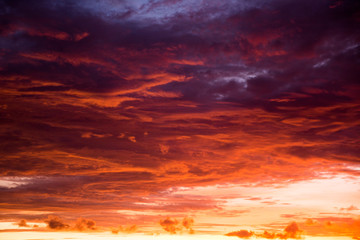 Beautiful sunset with yellow and violet sky at Bali, Indonesia.