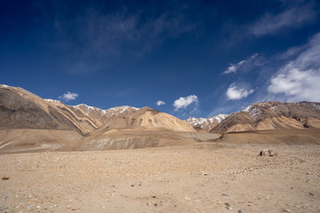 Fototapeta na wymiar The landscape view of Leh geography. Mountain, Road, Sky and Snow. Leh, Ladakh, India.