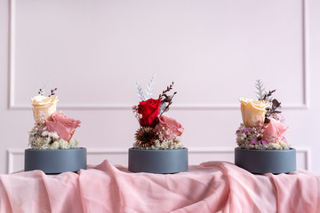 Long-lasting roses in a glass dome