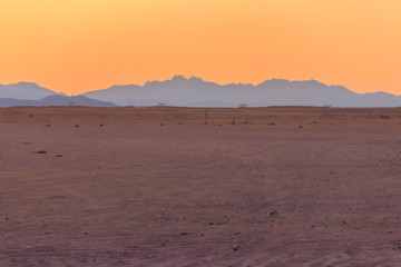 Fototapeta na wymiar View of the Arabian desert in Egypt at sunset