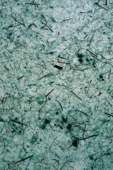 Abstract turquoise texture made with recycled paper. 