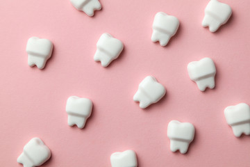Fototapeta na wymiar Healthy white teeth on pink background