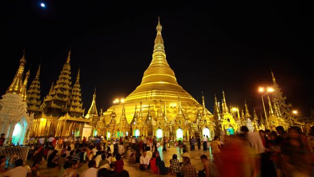 YANGON, MYANMAR - FEB 14: Shwedagon Pagoda in Yangon, Myanmar on February 14, 2014. Shwedagon Pagoda, also known as Great Dagon Pagoda, dates back 2500 years and is 99 meters tall in height.
