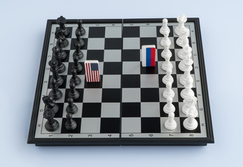 Symbols flag of Russia and the United States on the chessboard. The concept of political game.