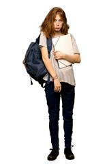 Fototapeta premium A full-length shot of a Young redhead student with sad and depressed expression over isolated white background