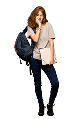 Fototapeta premium A full-length shot of a Young redhead student with toothache over isolated white background