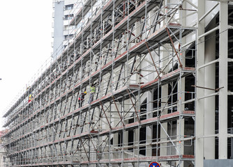 Building of a modern business building on the construction site