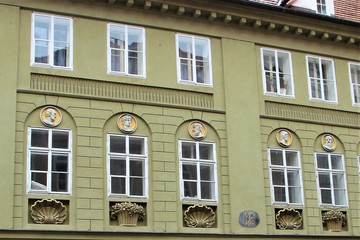 Fototapeta na wymiar Fragment of a building of classical European architecture in Prague, Czech Republic.