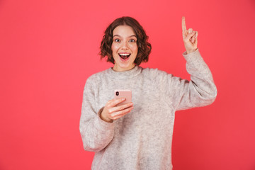 Portrait of a cheerful young woman standing
