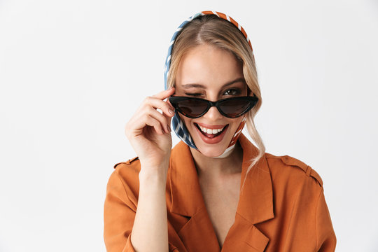 Happy Young Woman Wearing Silk Stylish Scarf Posing Isolated Over White Wall Background Wearing Sunglasses Winking.