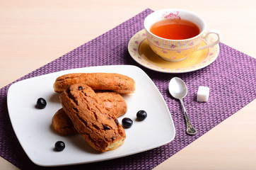 blueberry muffins and a cup of tea