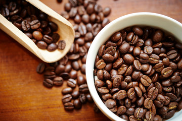 Coffee beans in cup