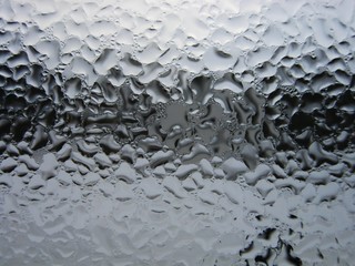 Large drops of water on the window