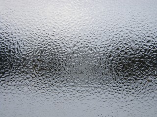Large drops of water on the window