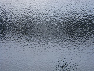 Large drops of water on the window