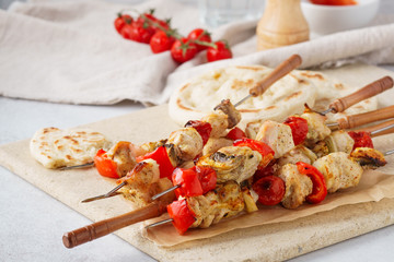 Homemade chicken shish kebab with mushrooms and bell peppers.