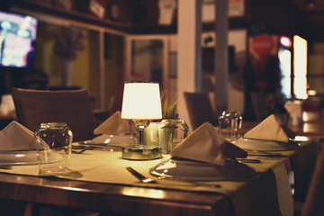 restaurant table for four with a night light