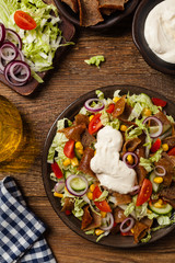 Gyros, kebeb. Salad with mutton and vegetables.