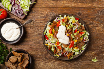 Gyros, kebeb. Salad with mutton and vegetables.