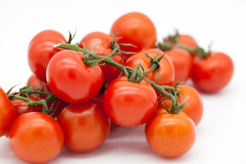cherry tomatoes on a white background