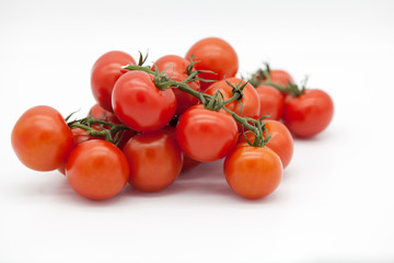 cherry tomatoes on a white background